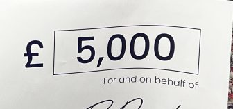 And the winner is… agency network presents cheque for £5,000