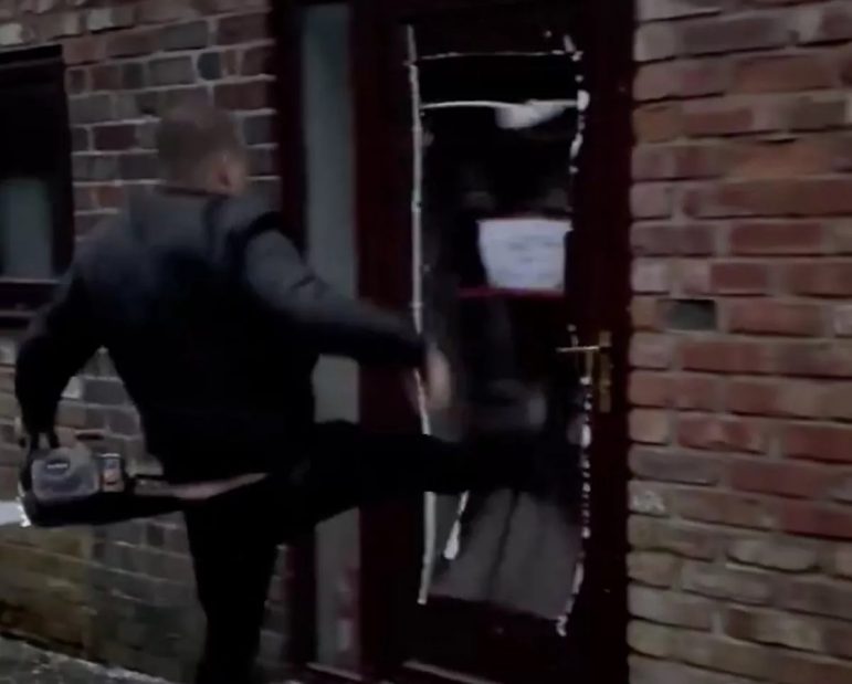 Furious landlord filmed using a chainsaw to cut through door to evict