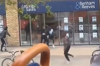 Man stabbed outside estate agents as terrified staff hid inside